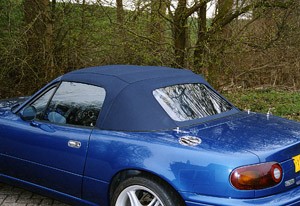 Cabriokap Mazda MX5 NA  stof blauw, ruit PVC, rits